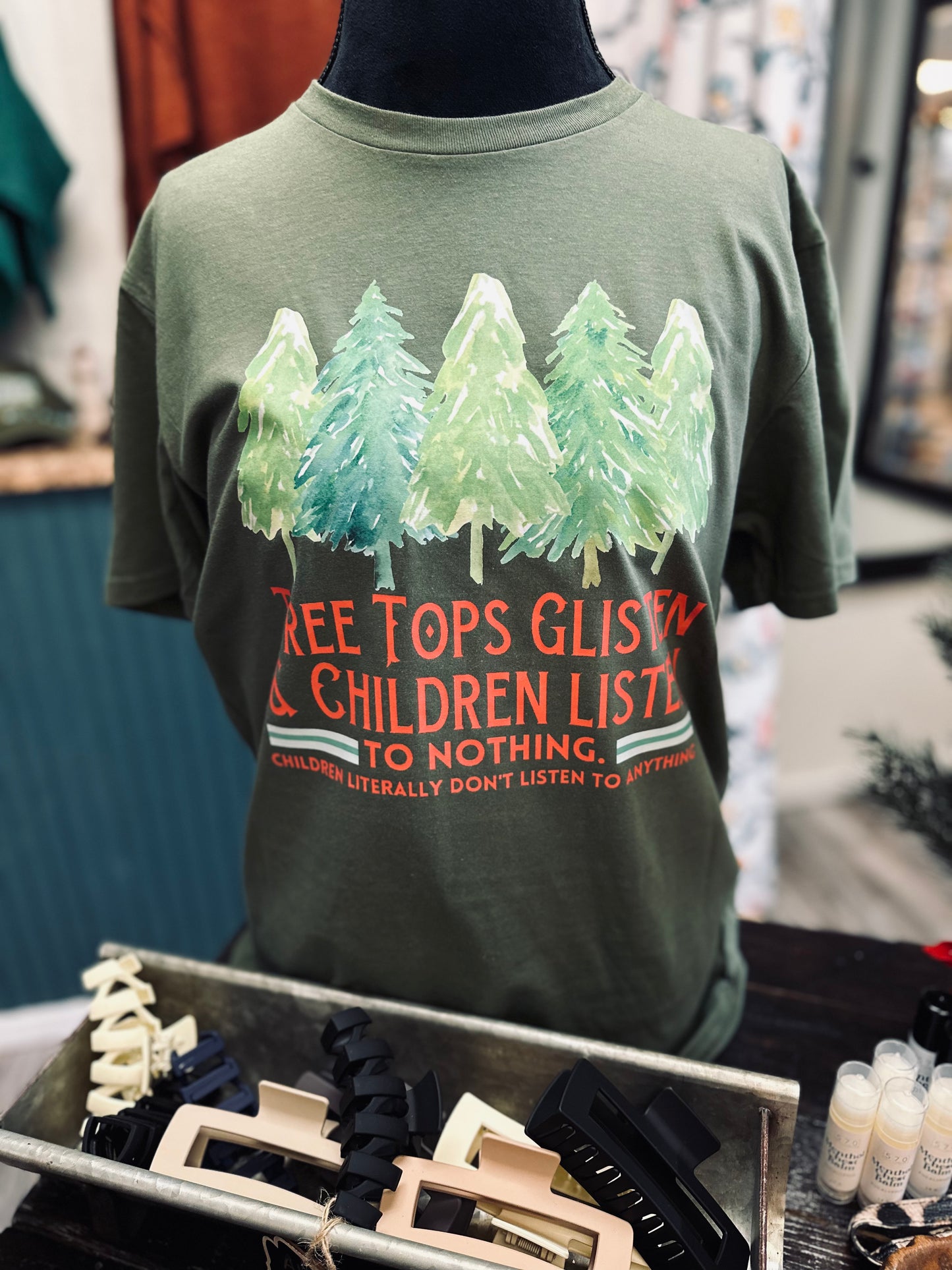 Tree tops glisten tee