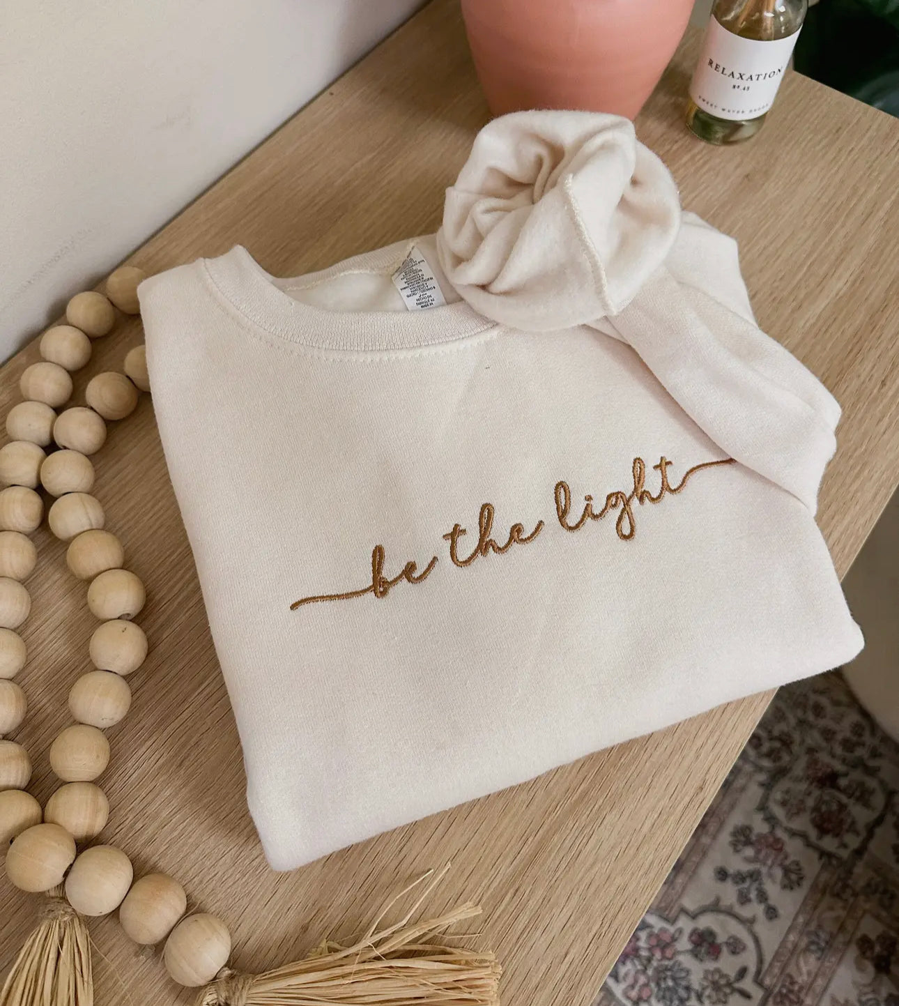 Be the light embroidered crewneck