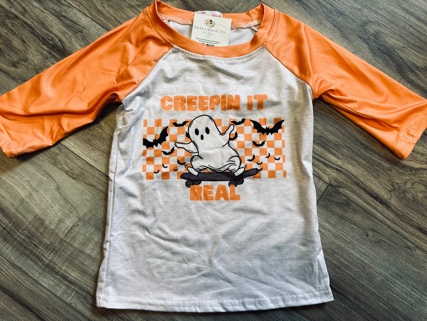 Creepin it real raglan